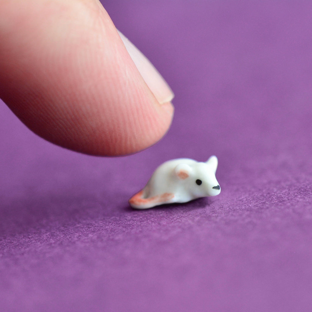 World's Tiniest White Mouse Figurine